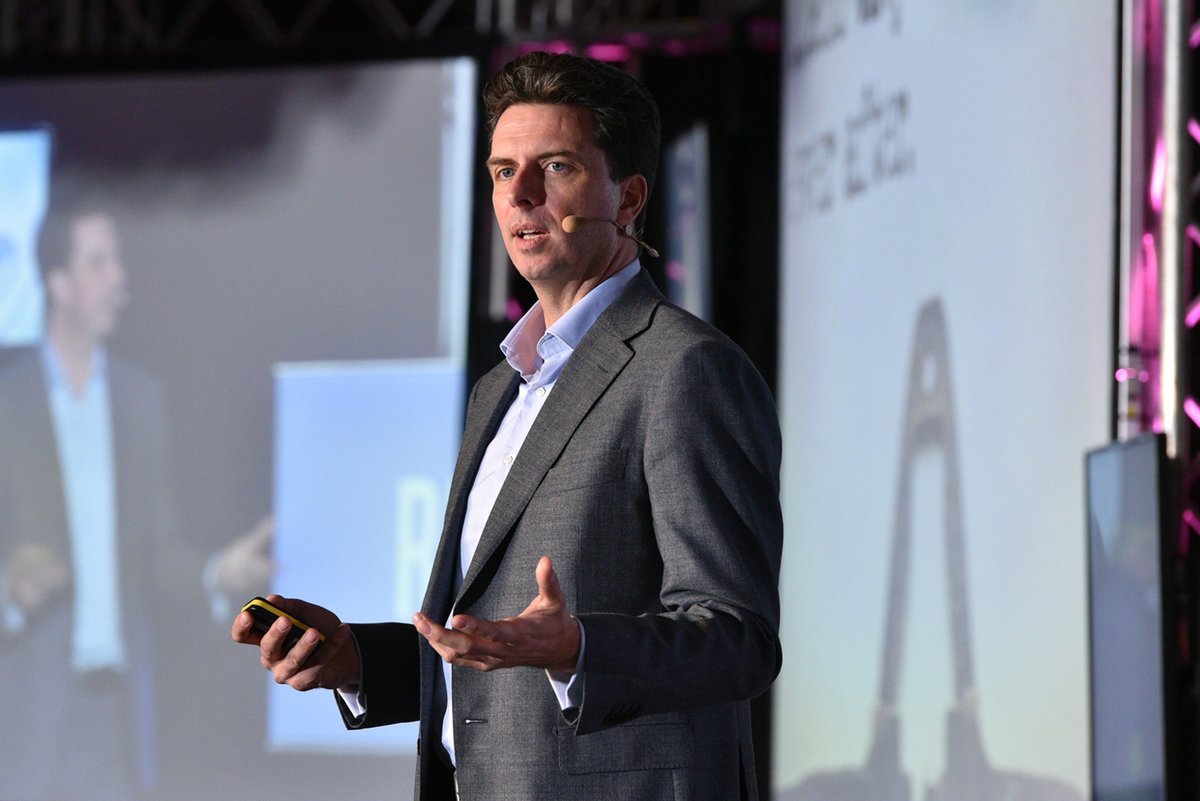 Spencer Waldron speaking at an event in Malta